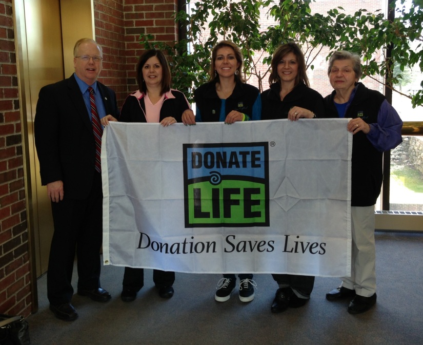With our mayor, Mayor Boughton (Danbury, CT) at City Hall with the Donate Life flag which is raised for the month of April for Donate Life Awareness month (Left to Right: Mayor Boughton, my aunt Dana, me, my aunt Caryn, my grandmother Rose).